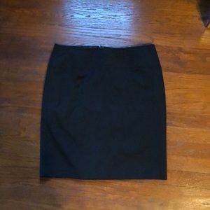 a black skirt, with half zipper in back. worn once